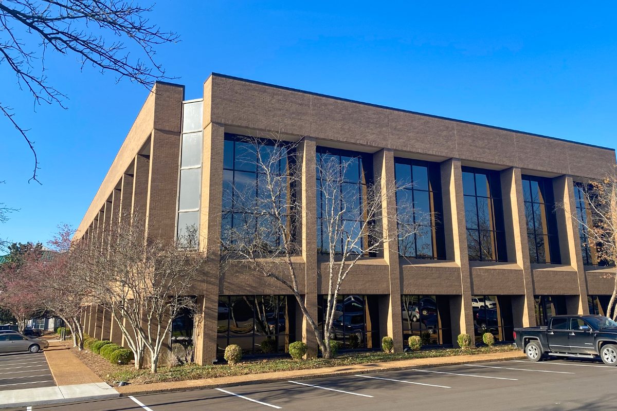 Exterior view of DCCM's Nashville office on a clear blue day